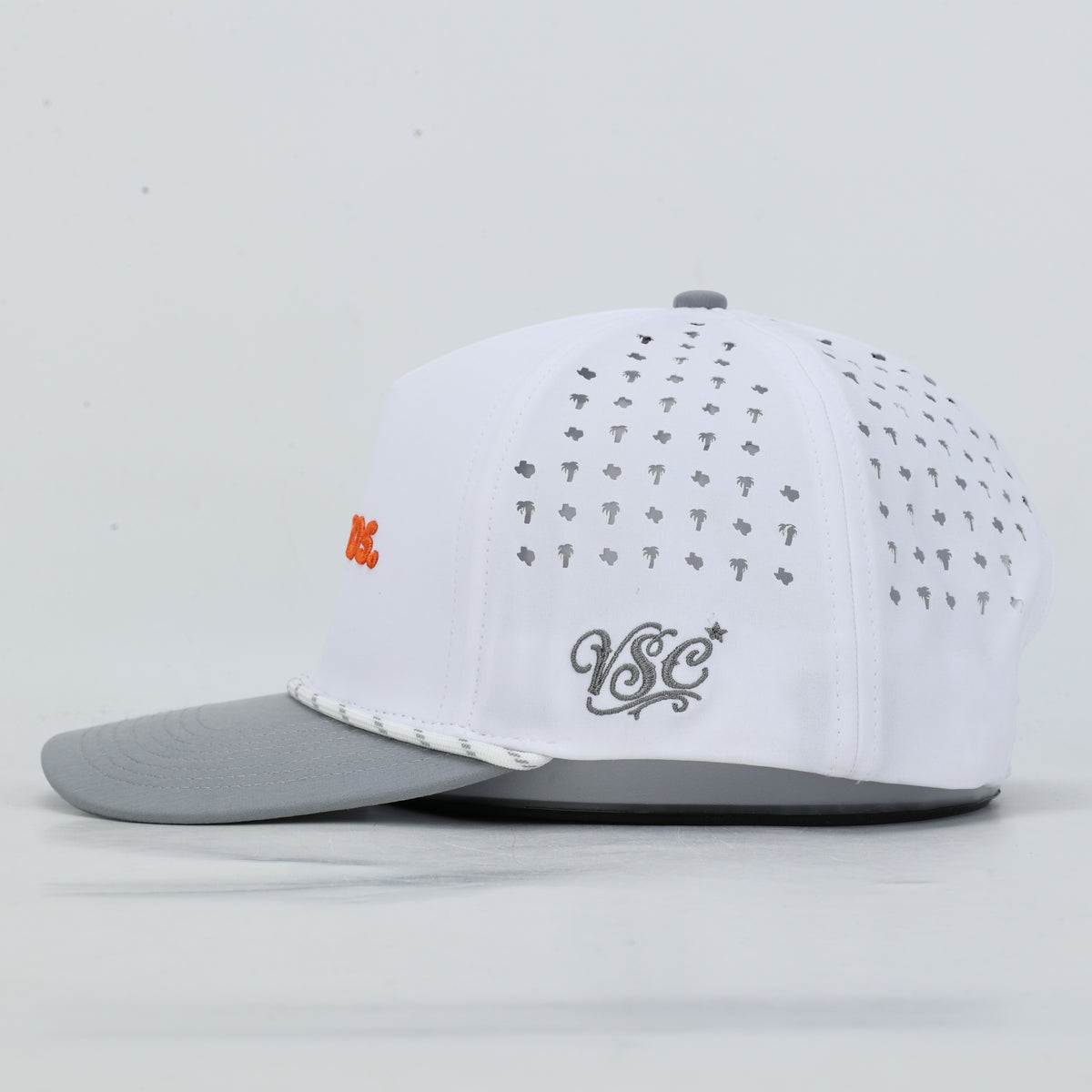 Vaqueros Rope Hat, White, left side profile with gray VSC monogram and palm and Texas perforation