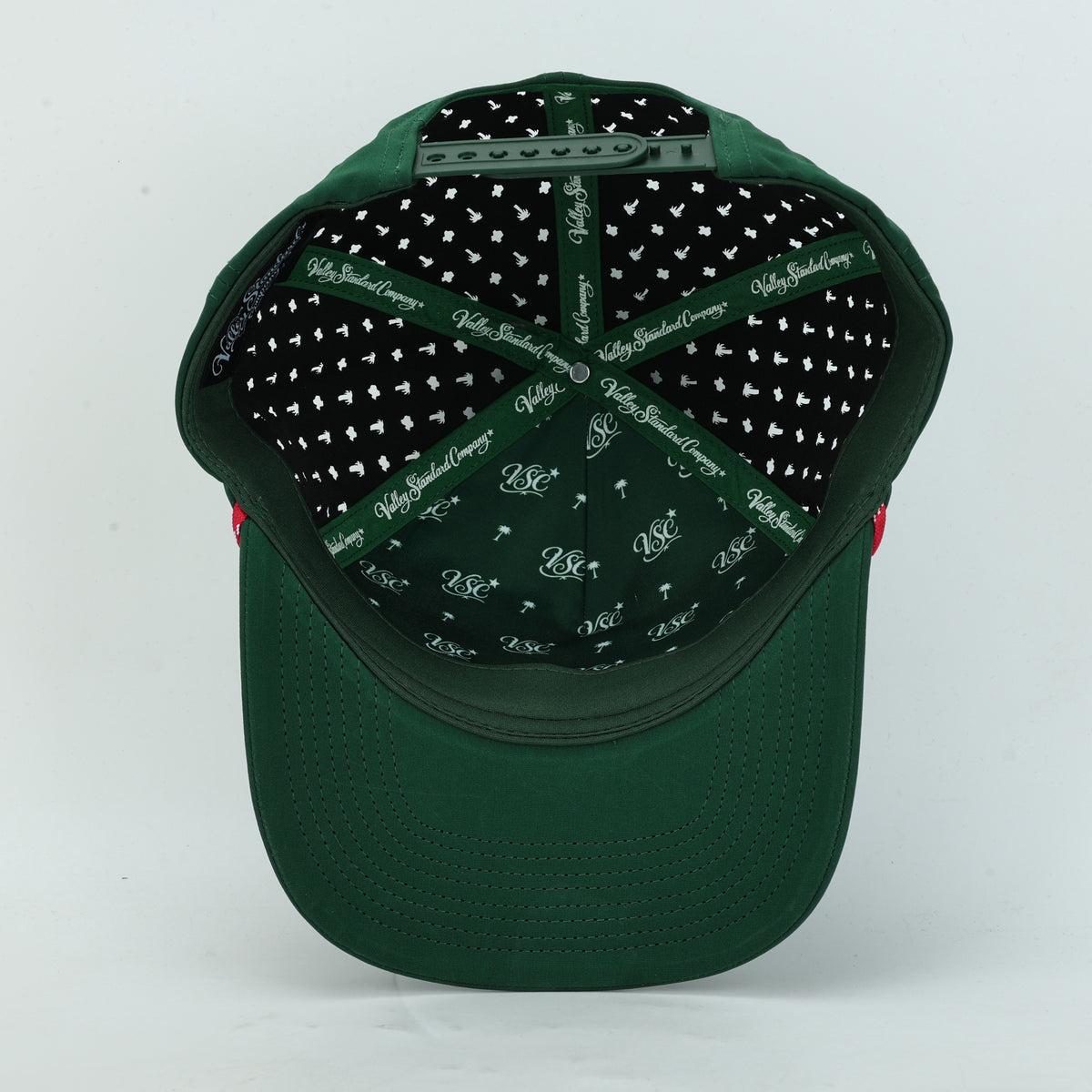 Tee Time Mexico Green Rope Hat, underside view of the green bill and printed interior taping