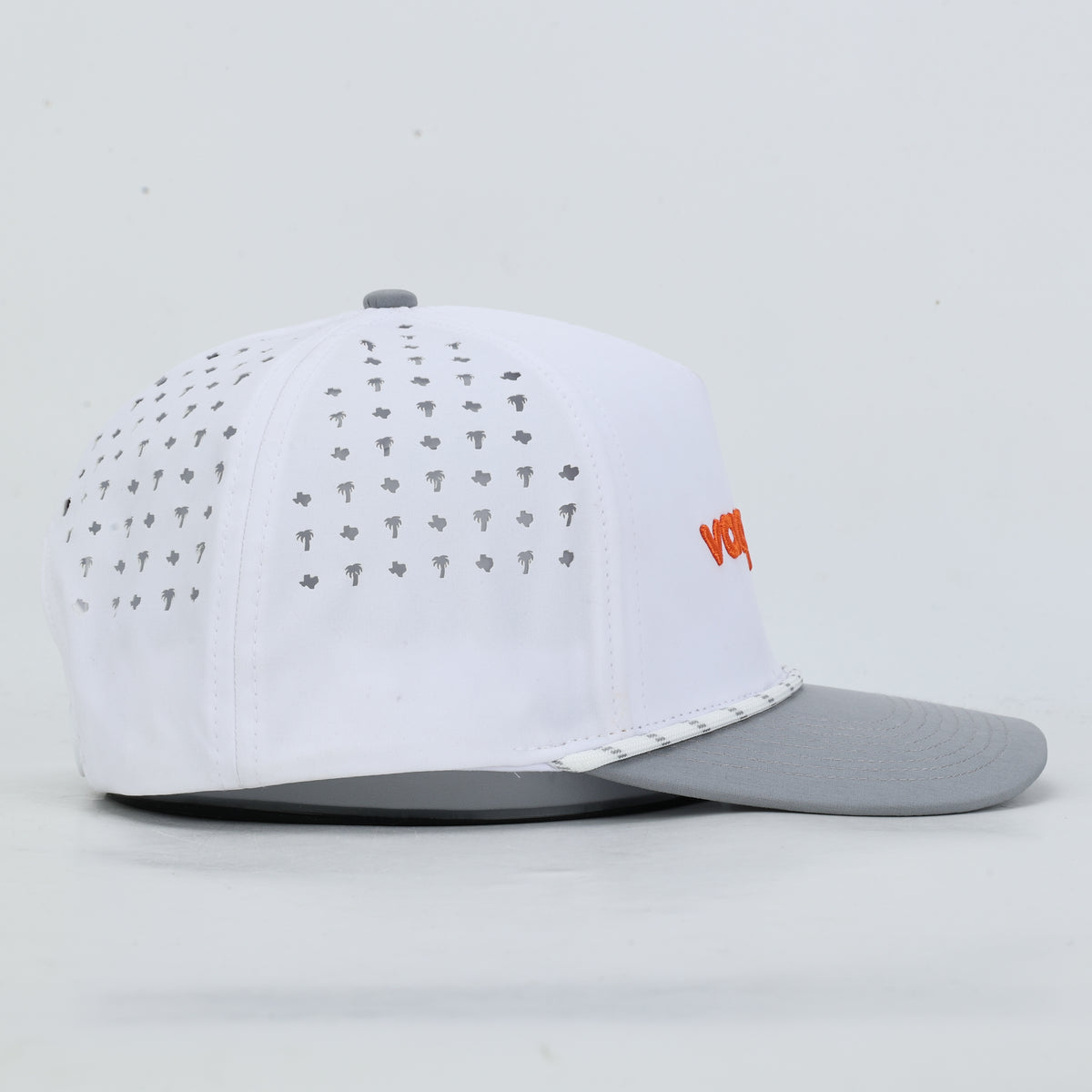 Vaqueros Rope Hat, White, right side profile of the laser cut perforation and gray bill